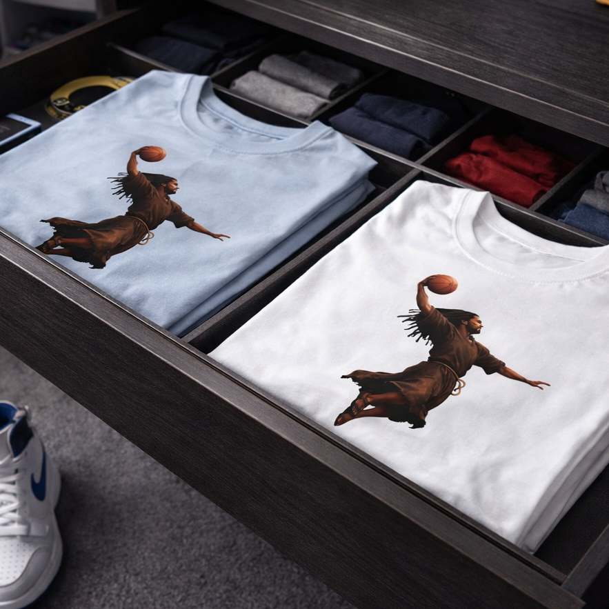 Faith meets hang time when Jesus rises, the Kingdom dunks. Hoops, hope, and holy confidence in one bold tee.