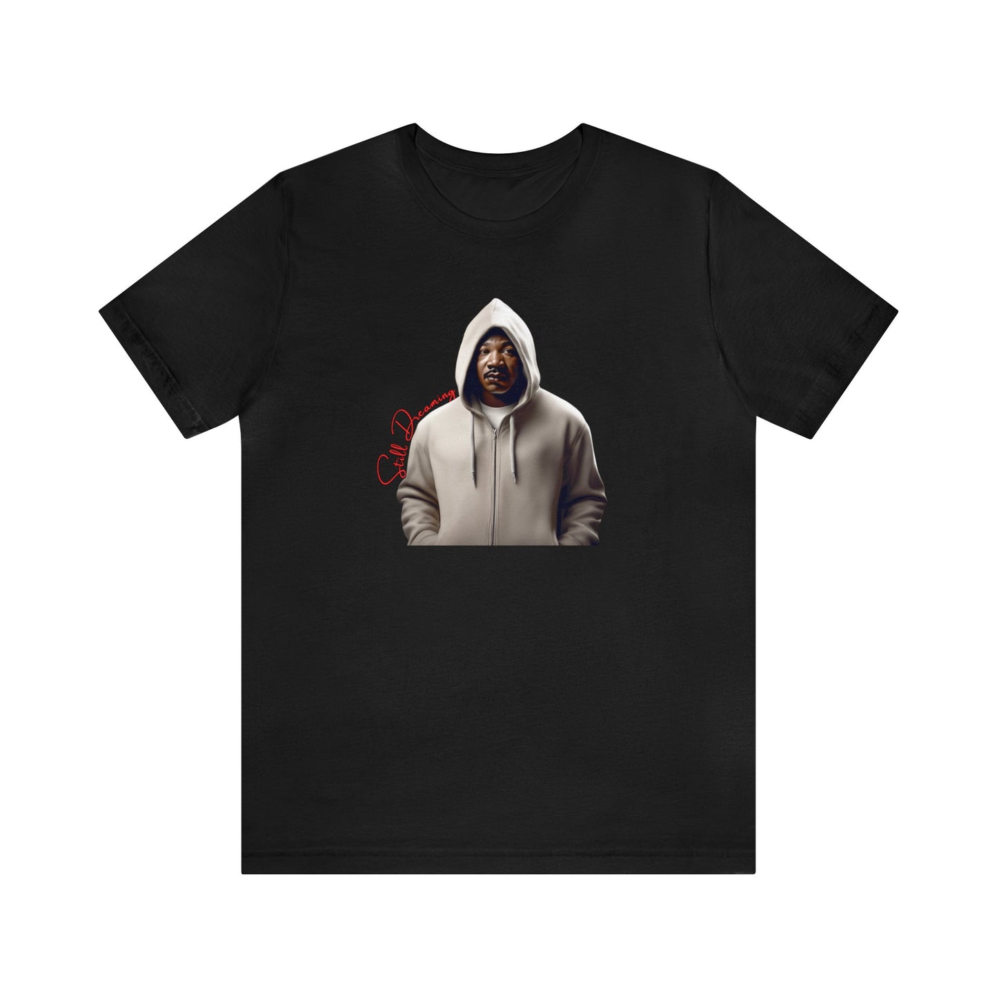 Still Dreaming Tribute Tee features MLK in a hoodie symbolizing resilience. A call to action Black History Month Gift Tee